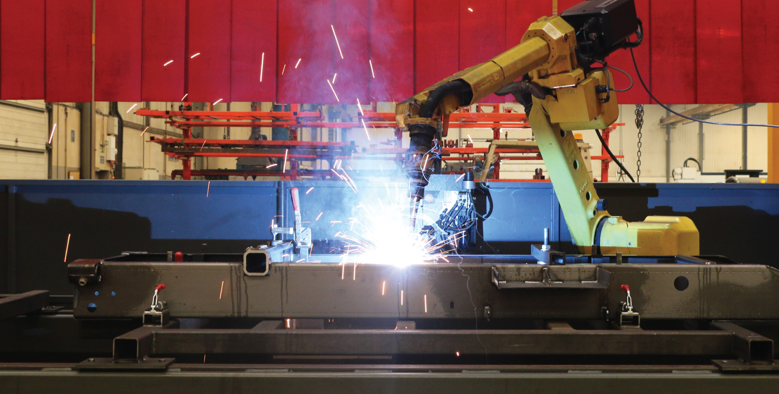 MOTOFIL Monobloc robotic welding cell working on a metal assembly